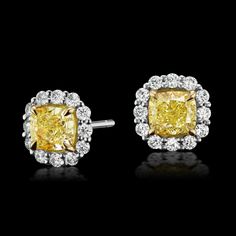 Natural Fancy Yellow Cushion Diamond Stud Earrings in 18k Two Tone Gold Price: $ 7,900 Item Details: * Total Diamond Weight:  2.70 Ctw. * Center Stone Diamond Weight:  2.02 Ctw. ** Diamond Color Clarity: Natural Fancy Yellow & G Color VS1 Clarity * Diamond Shape: Cushion & Rounds * Setting Type: Classic Prong Setting * Gold Kt: 18K Two Tone Gold. * Total Gold Weight:  3.97 Grams * Custom Gold Color: Rose Gold, Yellow Gold, White Gold * Made to Order.  * Ready to Ship in 7 Working Days Services: * Free Cleaning & Polish for lifetime * Appraisal Value Certificate (Charges Applicable) *All our diamonds are 100% genuine, natural and conflict-free. * Luxury Yellow Gold Cluster Earrings With Halo Design, Luxury Yellow Gold Earrings With Halo Design, Gia Certified Luxury Diamond Earrings For Formal Occasions, Gia Certified Yellow Gold Diamond Earrings For Formal Occasions, Formal Yellow Jewelry With Halo Design, Luxury Diamond Earrings With Halo Design, Formal Gia Certified Yellow Gold Diamond Earrings, Luxury Yellow Diamond Earrings As Gift, Luxury Cluster Earrings With Halo Setting