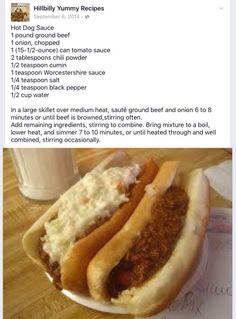 two hotdogs are on a plate with mashed potatoes and ketchup