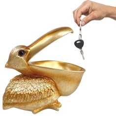 PRICES MAY VARY. Home Decor: Creative Handicraft Pelican Statues Keys and Cell Phone Holder,add a touch of style to your home. Storage Basket: Keep entryways or desk neat and tidy with this toucan ornament. It has a large storage space, great for holding keys, wallets, phones and other small accessories. Application: Use wherever more storage is needed in hallways, entryways, living room, dining room and more. Material: The pelican statue is made from high quality resin material, strong stabilit Keys Bowl, Small Bedroom Ideas For Women, Bowl Storage, Pelican Bird, Key Bowl, Basket Decor, Bar Office, Bird Statues, Candy Bowl