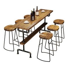 a wooden table with four stools next to it