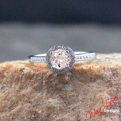 Hey, I found this really awesome Etsy listing at https://www.etsy.com/listing/179498707/morganite-diamond-channel-set-halo Elegant White Gold Morganite Wedding Ring, Wedding Halo Ring With Pave Setting And Round Cut, Pink 14k White Gold Wedding Rings, Morganite Diamond Ring With Center Stone For Wedding, Morganite Diamond Ring With Halo Design For Gift, Round Halo Ring With Pave Setting For Wedding, Silver Halo Ring With Pave Setting For Wedding, Sterling Silver Cluster Ring With Halo Setting For Wedding, Pink Sterling Silver Halo Ring For Wedding