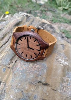 Nothing says "I love you" like a handcrafted gift from the heart. Because they are attractive, elegant, and lightweight, our engraved wood watches are the perfect gift for that special someone. This personalized wood watch is the ideal gift for the man in your life who has left an indelible impression on you. This watch is crafted of high-quality wood and will bring a smile to the special someone's face for years to come, as well as remind them of your love. The watch comes with a box and jewelry pillow, as well as a transparent plastic protective covering for the watch face and a removable plastic tab. **CUSTOM ENGRAVING** Please make sure to have your message spelled correctly. It will be engraved the exact way you present it to me. If you are using a handwritten message please send me a Anniversary Gift For Him, Watch Gift, Groomsmen Gift, Gift For Husband, Anniversary Gifts For Him, Engraved Wood, Hand Crafted Gifts, Watch Gifts, Wristwatch Men