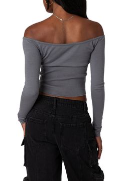 Slender ribbing texturizes the hem of a shoulder-baring crop top accented by dainty ties above the chest. Split off-the-shoulder neck with ties Long sleeves 95% polyester, 5% spandex Machine wash, dry flat Imported Spring Cropped Tops With Ribbed Neckline, Spring Fitted Crop Top With Ribbed Neckline, Spring Solid Crop Top With Ribbed Neckline, Solid Color Crop Top With Ribbed Neckline For Spring, Fitted Crop Top With Ribbed Neckline For Spring, Spring Crop Top With Ribbed Neckline, Fitted Trendy Crop Top With Ribbed Neckline, Trendy Fitted Crop Top With Ribbed Neckline, Fitted Crop Top With Ribbed Neckline For Fall