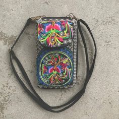 Colorful Embroidery On Black. Front Pocket 6 X 3.5" With Flap That Snaps. Zippered Body 7.5 X 4 X 0.75". Inside, 3 Main Compartments, One With Zipper, And 8 Card Pockets. Removable Strap 50" Length. Nwot Embroidered Wallet, Embroidery On Black, Colorful Embroidery, Front Pocket, Purse Wallet, Bag Lady, Purse, Wallet, Zipper