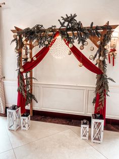 a white room with red drapes and decorations