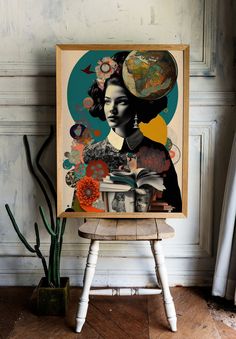 a painting on a wooden chair next to a potted plant