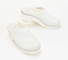 The classic clog gets a contemporary update with this translucent design. Sonja is the clear choice if you want a shoe that's effortless to slip into, comfortably cushioned with a rocker bottom outsole, and a conversation starting style you'll love to show off. From Dansko. Classic White Closed Toe Clogs, Classic White Round Toe Clogs, Classic White Clogs With Cushioned Footbed, Classic White Clogs With Rubber Sole, Modern Slip-on Clogs, Spring Clogs With Translucent Outsole And Round Toe, Modern White Leather Clogs, Modern Synthetic Clogs With Slip-resistance, Modern Slip-resistant Round Toe Clogs