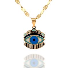 Unlock the mystical allure of ancient Egypt with our Hand-Painted Egyptian Evil Eye Pendant. This beautifully hand-crafted piece of jewelry seamlessly combines the timeless power of the Evil Eye symbol with the rich cultural heritage of Egypt, resulting in a stunning and meaningful accessory. Product Specifications:  * Material: 14k Solid Gold, hallmarked 14K or 585 for authenticity * Length: 23mm / 0.90in * Height: 17mm / 0.67in  14k Solid Gold Chains: * Adjustable Chain 16"18" 0.5mm * Sun Oval Spiritual Pendant Necklace With Artistic Design, Symbolic Blue Engraved Necklaces, Symbolic Blue Necklaces With Charms, Symbolic Evil Eye Medallion Necklace, Bohemian Gold Necklace With Hand Painted Details, Bohemian Gold Necklace Hand Painted, Bohemian Gold Hand Painted Necklace, Bohemian Hand Painted Gold Necklaces, Handmade Symbolic Blue Necklaces