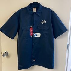 Navy Blue Moon Dickies Large Work Shirt Blue Work Shirt With Pockets, Blue Workwear Shirt With Pockets, Navy Short Sleeve Tops With Button Closure, Blue T-shirt With Button Closure And Crew Neck, Blue Cotton Short Sleeve Shirt For Work, Navy Short Sleeve Tops For Work, Blue Crew Neck Shirt With Button Closure, Blue T-shirt With Pockets And Short Sleeves, Blue Relaxed Fit Short Sleeve Shirt For Work