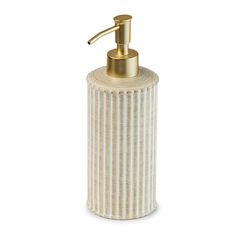 a white and gold soap dispenser on a white background