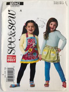 See&Sew 5942 Children's/Girls' Aprons: Apron A: Contrast overskirt, ties, pockets, and bias binding. Apron B: Contrast pockets, ties, and strap. Suggested Fabrics: Cotton, Cotton Blends, Calico, Novelty Prints. Unsuitable for obvious diagonals. Sizes (3-4, 5-6, 7-8) 11 Pattern Pieces are given Copyright 2013 Rated: Easy Sizes 3-4 Chest: 22-23 in. Waist: 20 1/2-21 in. Hip: 24 in. Sizes 5-6 Chest: 24-25 in. Waist: 21 1/2-22 in. Hip: 25-26 in. Sizes 7-8 Breast: 26-27 in. Waist: 23-23 1/2 in. Hip: 27-28 in. Pattern Condition: Uncut, Factory Folded Pattern. The envelope has shelf wear including slightly worn corners and there is a stamp on the front- see images. Please see photos for additional info and supply requirements. Stored in a pet and smoke free home and studio.  Final sale. Child Apron Pattern, Apron Pattern, Craft Apron, Girl Apron, Apron Sewing Pattern, Simplicity Dress, Childrens Aprons, Sewing Aprons, Butterick Pattern