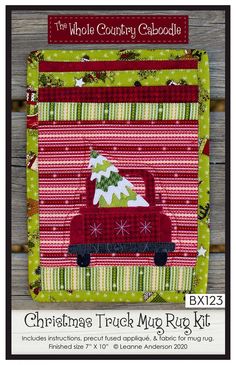 a christmas truck mug rug is shown on a wooden background with the words, whole country caboose