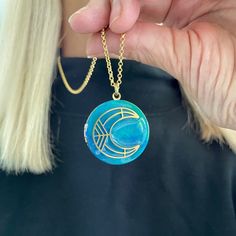 This beautiful blue hand painted locket holds a brass half moon under resin.  The locket is brass and we can add your photos or a photo and photo message on the inside of the locket. This locket is perfect for family shots and makes a wonderful gift for the one you love.  The blue swirls  are of multiple blues which look like a south pacific ocean. Makes a great gift for Mom, girlfriend, wife or sister! Visit my shops for more items like monocles and vintage finds percivalandhudson.etsy.com thes Great Gifts For Mom, Blue Hand, South Pacific, Pacific Ocean, Locket Necklace, Half Moon, Crescent Moon, Beautiful Blue, Gift For Mom