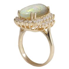 Stamped: 14K Yellow Gold Total Ring Weight: 7.0 Grams Ring Length: N/A Ring Width: N/A Gemstone Weight: Total Natural Opal Weight is 5.26 Carat (Measures: 16.20x11.90 mm) Shape: Oval Color: Multicolor Diamond Weight: Total Natural Diamond Weight is 1.05 Carat Quantity: 30 Color: F-G, Clarity: VS2-SI1 Face Measures: 19.80x18.65 mm Sku: [702569W] Luxury Yellow Gold Opal Ring With Gemstone Accents, Luxury Yellow Gold Opal Ring With Polished Finish, Antique Yellow Gold Opal Ring Collectible, Luxury Yellow Gold Opal Ring Collectible, Luxury Gold Opal Ring Hallmarked, Yellow Gold Diamond Ring, Australian Opal, Natural Opal, Gold Diamond Rings