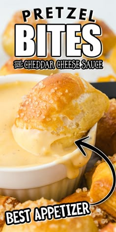 an appetizer being served in a bowl with the words pretzel bites and cheddar cheese sauce