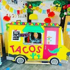 the taco truck is decorated with decorations