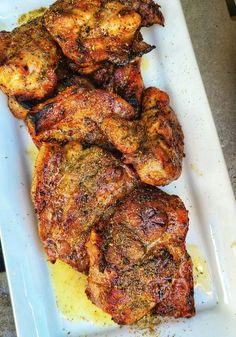 grilled chicken wings on a white plate