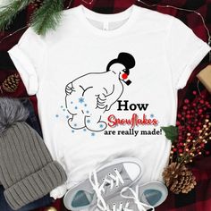 a t - shirt that says how snowflakes are really made on the front