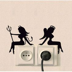 an electrical outlet with two silhouettes on it