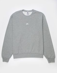 Nike Sb Logo Crewneck Sweatshirt. Elevate Your Essentials With This Soft, Brushed Fleece Crew. The Roomy Fit Gives You Space To Move And Layer, And The Nike Sb Logo On The Chest Gives It A Clean Finish. Crew Neck. Cuffed Long Sleeves And Hem. 82% Cotton 18% Polyester. Machine Wash. Imported. Plain Crewneck, Gray Crewneck, Basic Fleece Tops, Nike Gray Crew Neck Shirt, Nike Sweatshirt Gray, Basic Gray Fleece Tops, Nike Cozy Crew Neck Sweatshirt, Nike Gray Crew Neck Hoodie, Mens Nike Crewneck