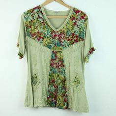 Vintage 90s/Y2K green multi embroidered rayon top. It is a free size style but it seems like a modern S/M depending on desired fit. There are some light spots on fabric, looks like part of the dye process but not sure. Please see all photos for condition and check the measurements for size. Shoulders 17" Sleeve 9 1/2" Chest 40" Length 25" CF Green V-neck Tops For Festival, Green Patchwork Crew Neck Top, Green Crew Neck Top With Patchwork, Casual V-neck Top With Multicolor Embroidery, Green Embroidered V-neck Blouse, Multicolor V-neck Top With Floral Embroidery, Green V-neck Hippie Top, Green Embroidered Crew Neck Blouse, Green Rayon Summer Blouse