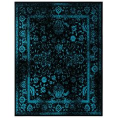 a black and blue rug with an ornate design