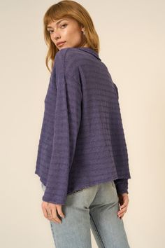 Lusting after: light, textured layers.Our Capistrano Collared Pullover is channeling allll of the coastal grandma vibes that we're obsessed with. This sweater knit fabric has a visually interesting texture, with a light mineral wash on top. The overall fit is relaxed, with a collared neckline, drop shoulders, and wide sleeves. Pair with denim shorts or throw on over a bikini on your next vacay. 62% Polyester33% Cotton5% Spandex Care Instructions:Machine wash cold. Wash inside out with similar co Casual Textured Knit Top For Spring, Casual Textured Winter Sweater, Textured Casual Tops For Loungewear, Casual Textured Sweater For Fall, Casual Textured Winter Top, Cotton Textured Knit Top For Layering, Textured Tops For Layering In Fall, Casual Textured Top For Winter, Textured Long Sleeve Spring Sweater