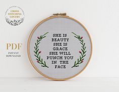 a cross stitch pattern with the words she is beauty she is grace she will punch you in the face