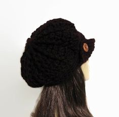 This is made to order. This hat is crocheted with chunky black acrylic yarn. Hand wash is recommended. Black Acrylic Beanie, Black Acrylic Yarn Beanie Cap, Black Acrylic Yarn Beanie, Black Brimmed Knitted Beanie, Black Knitted Brimmed Beanie, Black Slouchy Crochet Hat For Winter, Black Acrylic Hat, One Size Fits Most, Black Acrylic Hat One Size Fits Most, Black Slouchy Crochet Beanie Hat