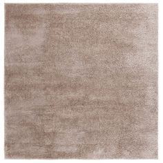 a beige rug on a white background with no one in the room to see it