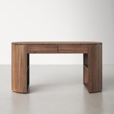 a wooden desk sitting on top of a white floor