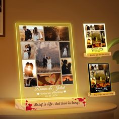 a couple's wedding photos are displayed on a table with their lights turned on