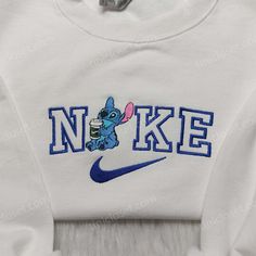 Stitch Nike Embroidered Shirt, Nike Inspired Embroidered Shirt, Disney Family Shirts Disney Nike Crewneck, Stitch Nike Hoodie, Stitch Nike Sweatshirt, Pull Nike Stitch, Nike Disney Sweatshirt, Stitch Nike, Nike Hoodies, Cute Disney Shirts, Nike Inspired