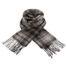 Model: A03248_MONOCHROME BUCHANAN 100% Lambswool Size: 56 inch x 12 inch Tartan / Plain / Multicolour Scarf Cosy and warm with an extra-soft finish EDINBURGH LAMBSWOOL Multicolor Scarf. This beautifully crafted lambswool scarf is a key accessory to your winter wardrobe. Wrap it over your outerwear as the weather turns colder to instantly add a stylish finish. Edinburgh Lambswool uses only the finest lambswool in the production of their knitwear which has strong natural qualities and is soft and Scottish Jewellery, Tartan Scarf, Cashmere Blanket, Key Accessories, Scottish Tartans, Cashmere Scarf, Wool Blanket, Winter Wardrobe, Plaid Scarf