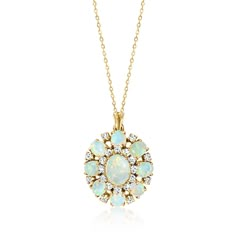 Ross-Simons - C. 1970 Vintage Opal, 1.00ct t. w. Diamond Cluster Pendant Necklace. 18". C. 1970. From our Estate collection, this stunning cluster pendant necklace swirls with a magnificent play of color and sparkle! 7x5mm-10x8mm oval opal cabochons create a sensational symmetrical design, studded by 1.00 ct. t. w. round brilliant-cut diamonds in between. Finely crafted in polished 18kt yellow gold. Cable chain. Lobster clasp, diamond and opal cluster pendant necklace. Exclusive, one-of-a-kind E Fine Jewelry Oval Necklace For Collectors, Oval Fine Jewelry Necklace For Collectors, Oval Multi-stone Necklace For Wedding, Anniversary Necklace With Large Oval Pendant, Opal Necklace Vintage, Opal Necklaces, 1920s Women, Symmetrical Design, Opal Birthstone