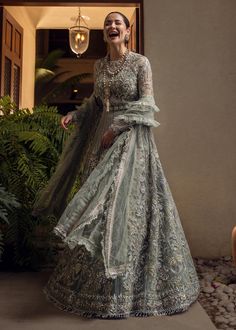 Elegant Lehenga For Wedding And Eid, Elegant Wedding Lehenga For Eid, Elegant Eid Wedding Lehenga, Elegant Gown With Sheer Dupatta For Ceremony, Elegant Formal Gown With Dabka Work, Elegant Wedding Gown With Sheer Dupatta, Elegant Wedding Dress For Eid Reception, Elegant Wedding Dress For Reception And Eid, Elegant Lehenga With Dupatta For Ceremony