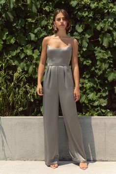 The Jonie jumpsuit, cut in our sumptuous luxe satin fabric, is a chic and modern choice for any formal event. A fully boned bodice lends flattering structure, and wide leg pants are comfortable and versatile. Elegant Strapless Jumpsuits And Rompers For Gala, Elegant Strapless Jumpsuit For Gala, Chic Sleeveless Jumpsuits And Rompers For Gala, Elegant Strapless Jumpsuits And Rompers For Night Out, Sleek Sleeveless Evening Jumpsuits And Rompers, Elegant Strapless Jumpsuit For Night Out, Elegant Formal Strapless Jumpsuit, Elegant Floor-length Strapless Jumpsuit For Formal Occasions, Elegant Wide Leg Jumpsuits And Rompers For Formal Events