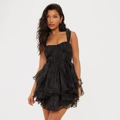 Nwt Prettylittlething Black Organza Thick Strap Tiered Skater Dress. Size 2 Turn Up The Drama With This Black Organza Thick Strap Tiered Skater Dress. Made From A Black Organza Material With Thick Straps And A Tiered Skirt Design, We're Seriously Obsessed. This Skater Dress Is Sure To Make A Statement At Your Weekend Plans. Bring All The Glam Vibes To Your 'Fit With Clear Heels, Gold Accessories And A Little Attitude. Square Neck Mini Dress With Ruffles For Night Out, Black Mesh Mini Dress For Spring, Black Embroidered Mini Dress For Spring, Black Mini Dress For Spring, Lined Mini Dress For Prom, Black Lined Mini Length Dresses, Black Mini Length Dress For Prom, Black Lined Mini Dress, Flirty Square Neck Midi Dress For Party