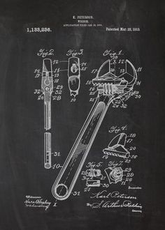 a black and white drawing of a wrench