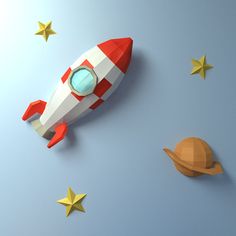 a paper model of a rocket ship with stars around it