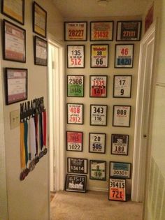 the hallway is decorated with posters and numbers