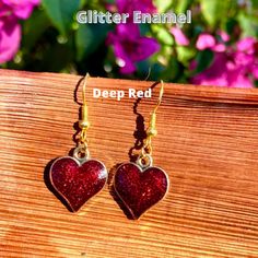 Show yourself or a friend some love with these adorable hypoallergenic sparkly glitter enamel heart earrings! These are great for formal or casual wear and are made of durable, brightly colored glittery enamel and metal alloy. Available in 3 colors: Deep red, hot pink and light pink Dangle length is approximately 1-inch. Heart charm is approximately 0.6-inch by 0.7-inch Hypoallergenic earring hooks Show Yourself, Valentines Earrings, Hypoallergenic Earrings, Earring Hooks, Red Hot, Heart Earrings, Deep Red, Heart Charm, 1 Inch