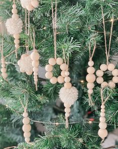 a christmas tree with ornaments hanging from it