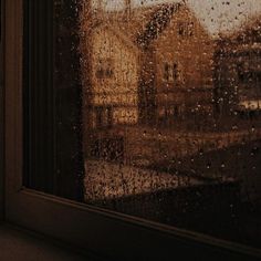 a window with rain drops on it