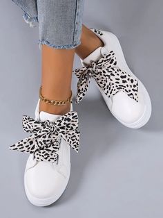 Chic and Stylish: Women's Leopard Lace-Up Front Skate Shoes - White Sn Trendy High-top Lace-up Shoes, White Lace-up Shoes For Summer, Trendy Flat Sneakers, White Flat Lace-up Shoes, Trendy Flat Sneakers With Laces, Trendy Flat Sneakers With Speckled Midsole, White Sneakers With Laces For Fall, Trendy White Sneakers For Fall, Chic Lace-up Sneakers For Summer