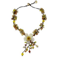 Glistening gems surround a white quartz flower in a hand-knotted necklace by Thailand's Nareerat. She selects a bright assortment of gems that include clusters of chip-cut serpentine carnelian and quartz. Round carnelians and dyed yellow quartz that represents April??s birthstone center the flower and are also dotted throughout the brown necklace of adjustable length. Hand Knotted Necklace, Yellow Quartz, Brown Necklace, Summer Necklace, Gift Jewelry, Quartz Necklace, Birthstone Necklace, Jewelry Creation, Handmade Artisan