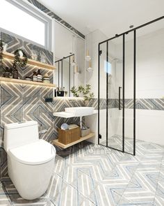 a bathroom with a toilet, sink and shower stall in it's center area