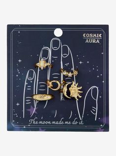 Channel the cosmos with this gold-tone stacking ring set! Featuring celestial sun  moon and star designs with sparkly gem detailing.Size 4  6 & 7Nickel-free alloy; acrylicSet of 5Imported Cosmic Aura, Sakura Art, Celestial Sun, Lampoon's Christmas Vacation, Blue Beetle, Halloween Horror Nights, Stacking Ring Set, Ghost In The Shell, Moon And Star