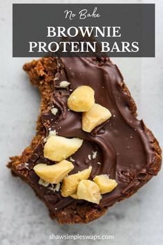 no bake brownie protein bars with chocolate frosting and banana slices on top