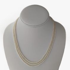 Indulge in the sheer elegance of this dainty Japanese Akoya pearl 3-strand nested necklace. Carefully crafted and finished with a 14K yellow gold Figure 8 Safety clasp, adorned with diamonds (0.10ct, NC.SI), this piece represents a fusion of artistry and luxury. Explore the enchanting world of cultured Akoya pearls, meticulously cultivated in the unspoiled waters of Japan. These tiny pearls exhibit a white color with a silver overtone, embodying grace and sophistication. The pearls, sized 2.5 to Elegant Multi-strand Necklace With Pearl Pendant, Multi-strand Pearl Pendant Necklace For Formal Occasions, Formal Multi-strand Necklace With Pearl Pendant, Classic Multi-strand Pearl Necklace For Wedding, Elegant Multi-strand Pearl Necklace For Formal Occasions, Elegant Double Strand Akoya Pearl Necklace, Elegant Multi-strand Jewelry For Anniversary, Elegant Multi-strand Necklace For Anniversary, Elegant Multi-strand Jewelry For Formal Occasions